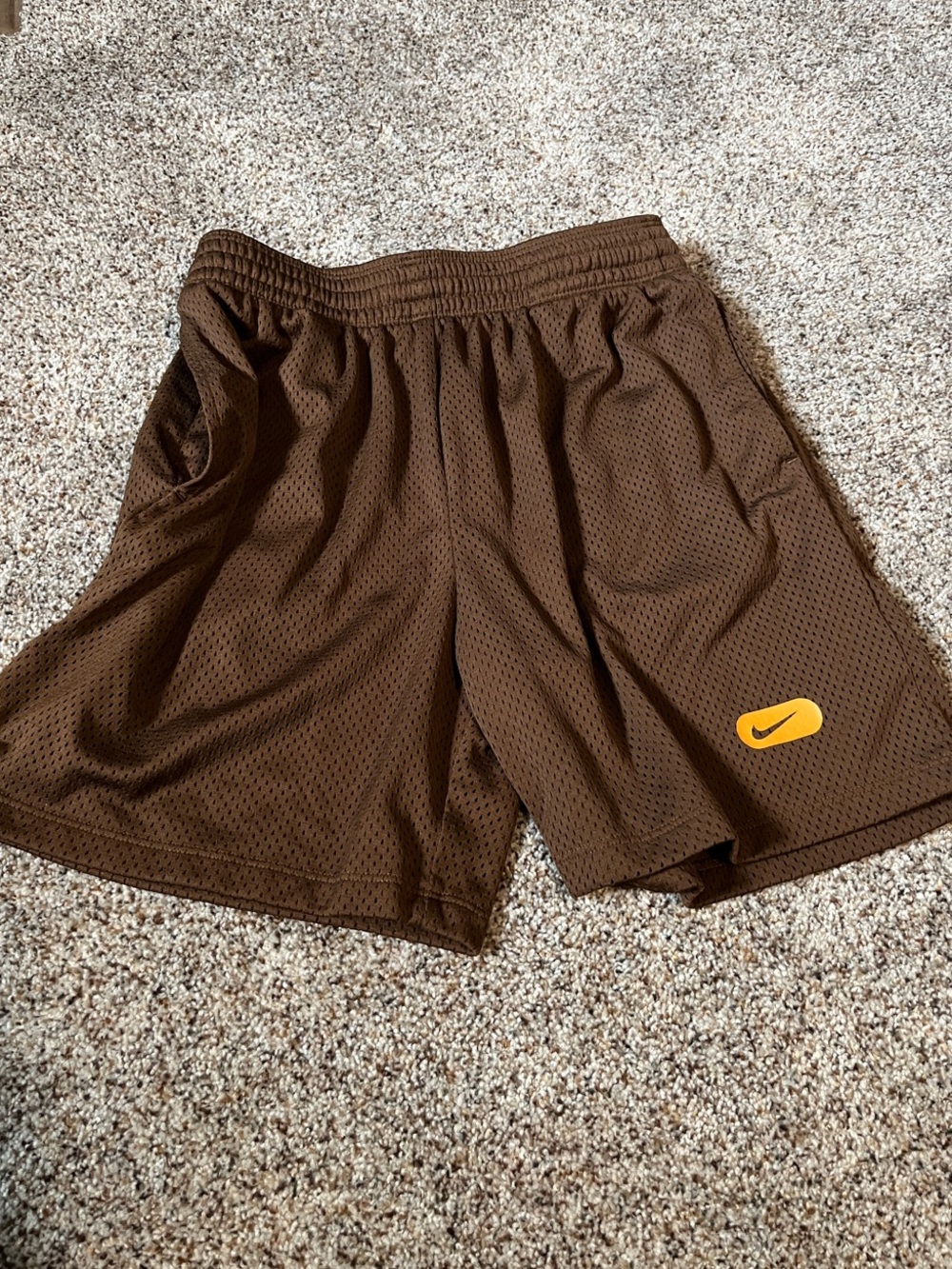 Nike Brown Mesh Athletic Shorts with Yellow Swoosh